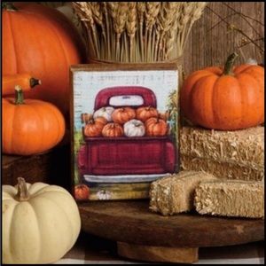 Red Truck full of Pumpkins